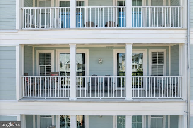 37 Fountain Dr W Unit 4C, Ocean City, MD 21842 - doorway to property featuring a balcony and covered porch