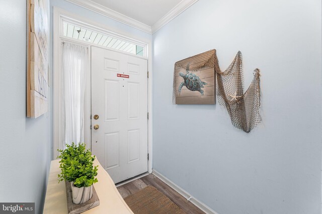 37 Fountain Dr W Unit 4C, Ocean City, MD 21842 - foyer entrance featuring wood finished floors and ornamental molding
