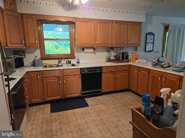 526 Fairground Rd, Newport, PA 17074 - kitchen with dishwasher, white stove, light floors, light countertops, and brown cabinets