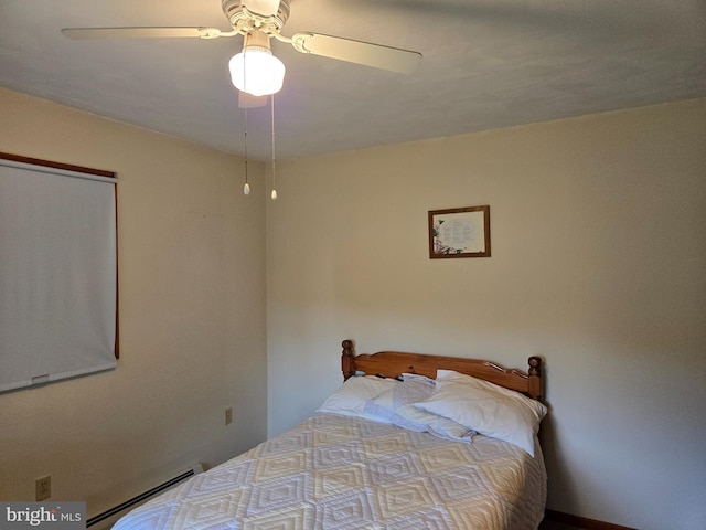 526 Fairground Rd, Newport, PA 17074 - bedroom with baseboard heating and a ceiling fan