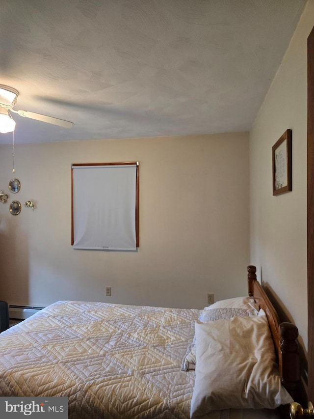 526 Fairground Rd, Newport, PA 17074 - bedroom featuring a baseboard radiator and a ceiling fan