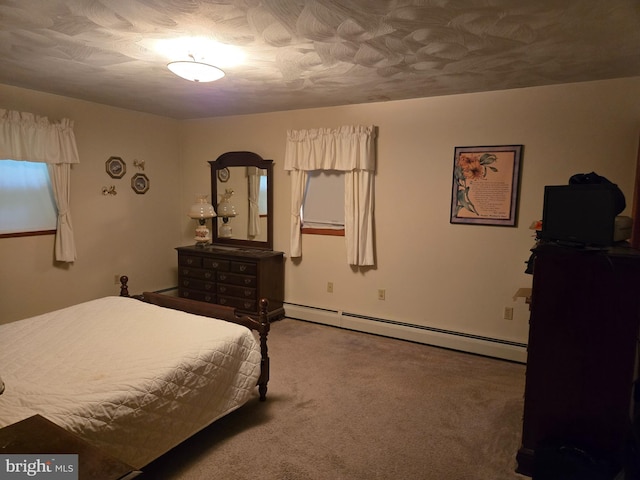 526 Fairground Rd, Newport, PA 17074 - bedroom with a baseboard heating unit and carpet floors