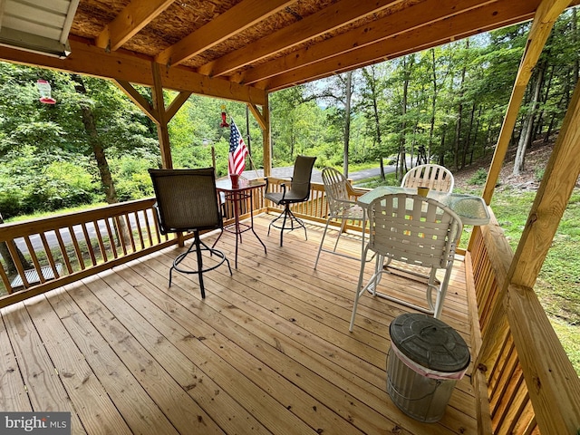 4677 Back Hollow Rd, Blain, PA 17006 - deck with outdoor dining area and view of wooded area