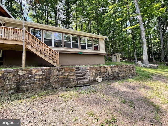 4677 Back Hollow Rd, Blain, PA 17006 - view of side of home with stairs, a wooden deck, and a shed