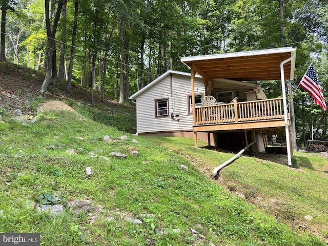 4677 Back Hollow Rd, Blain, PA 17006 - view of property exterior featuring a deck and a lawn