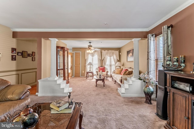 8910 Edison Ln, Clinton, MD 20735 - living room with ornate columns, crown molding, light carpet, and a ceiling fan