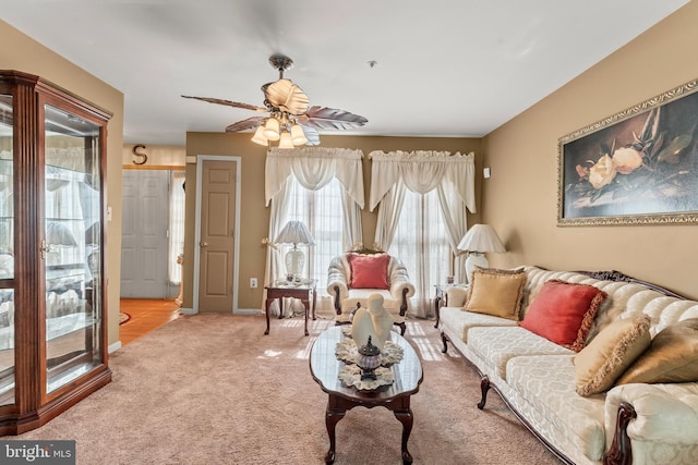 8910 Edison Ln, Clinton, MD 20735 - carpeted living area featuring ceiling fan and baseboards