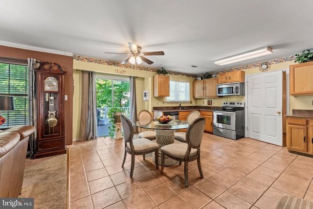 8910 Edison Ln, Clinton, MD 20735 - dining room with ceiling fan and light tile patterned floors