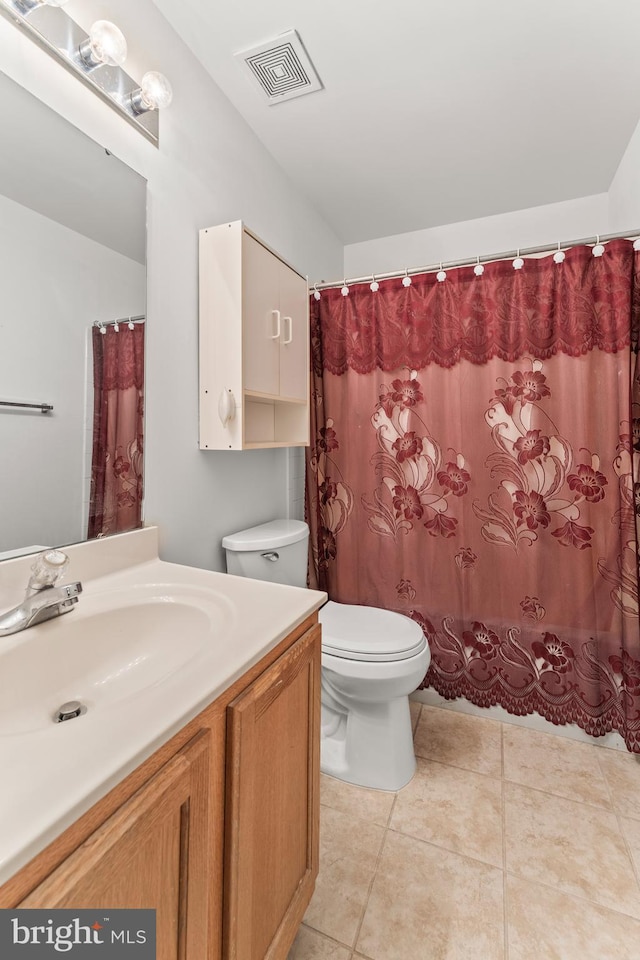 8910 Edison Ln, Clinton, MD 20735 - bathroom featuring vanity, tile patterned flooring, and curtained shower