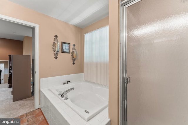 8910 Edison Ln, Clinton, MD 20735 - bathroom featuring a bath and a shower stall