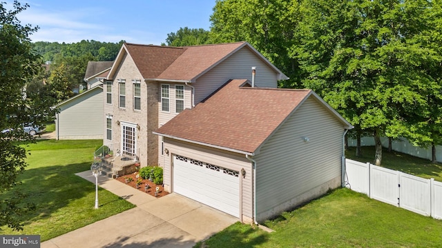8910 Edison Ln, Clinton, MD 20735 - view of side of property with a shingled roof, concrete driveway, and a garage