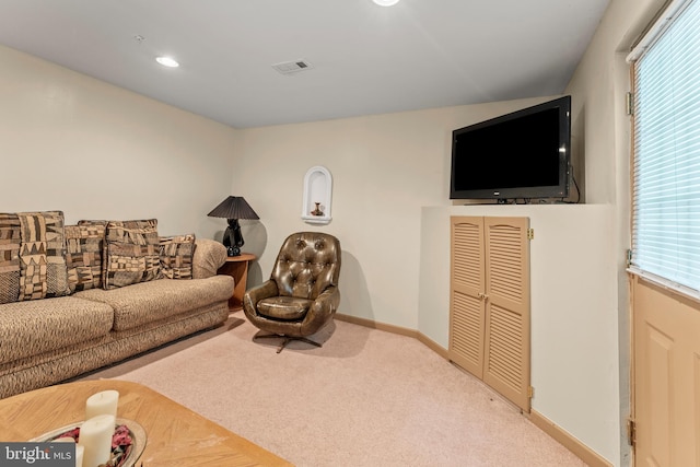 8910 Edison Ln, Clinton, MD 20735 - carpeted living area featuring healthy amount of natural light and recessed lighting