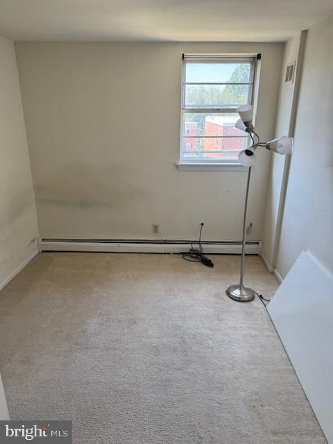 724 Susquehanna Rd, Philadelphia, PA 19111 - unfurnished room featuring baseboard heating and carpet