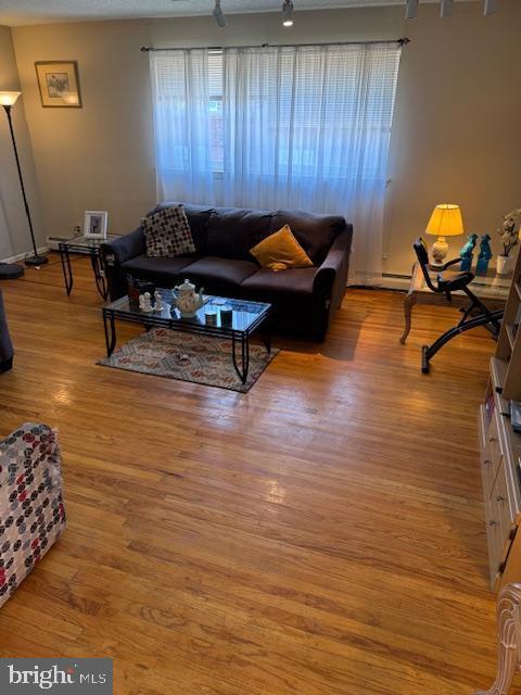 724 Susquehanna Rd, Philadelphia, PA 19111 - living room with wood finished floors