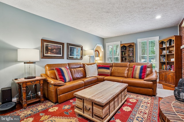 616 Silverstone Ct, Silver Spring, MD 20905 - living room featuring a textured ceiling and recessed lighting