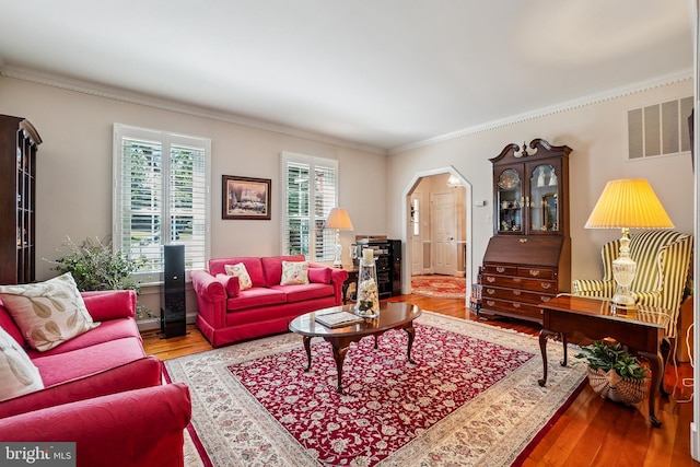 616 Silverstone Ct, Silver Spring, MD 20905 - living area with wood finished floors, crown molding, and arched walkways