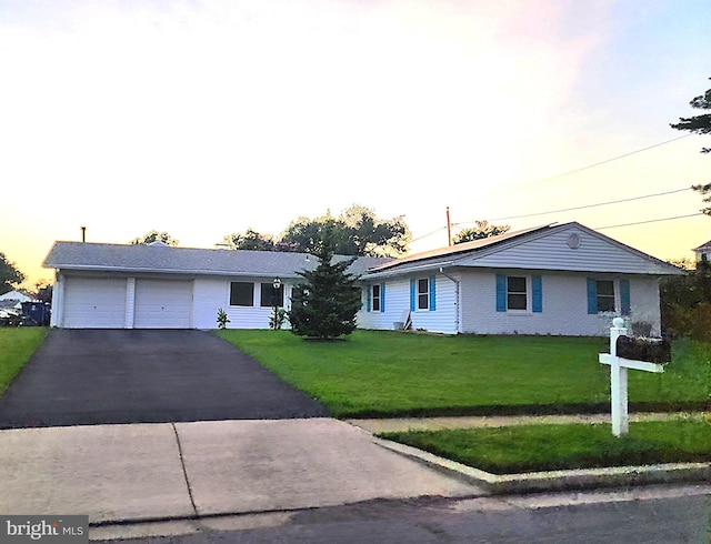 4306 Mystic Way, Fairfax, VA 22033 - ranch-style house with an attached garage, asphalt driveway, and a lawn