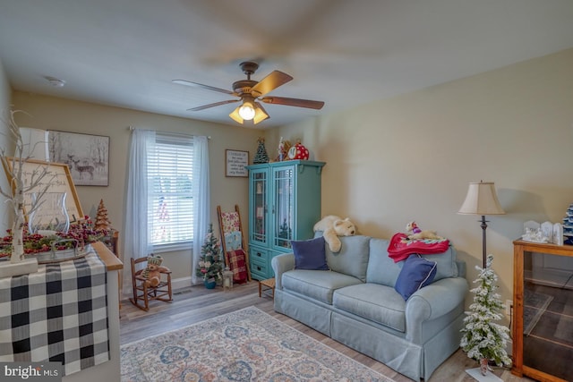 122 Lulu Ln, Dover, DE 19901 - living area featuring wood finished floors and ceiling fan