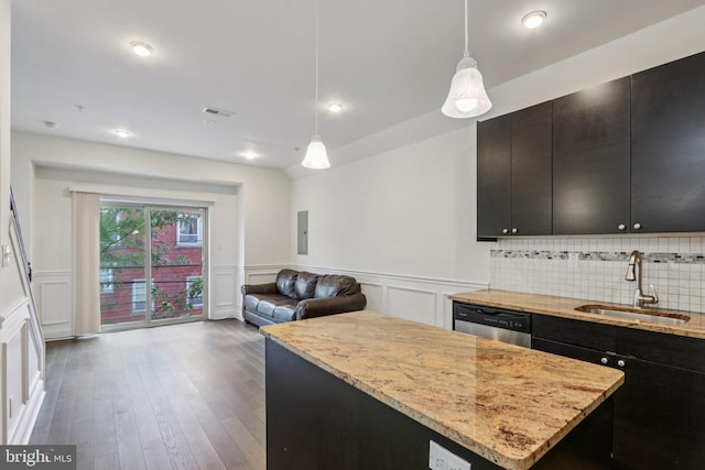605 N 12th St Unit B, Philadelphia, PA 19123 - kitchen with stainless steel dishwasher, dark cabinets, a kitchen island, wainscoting, and open floor plan