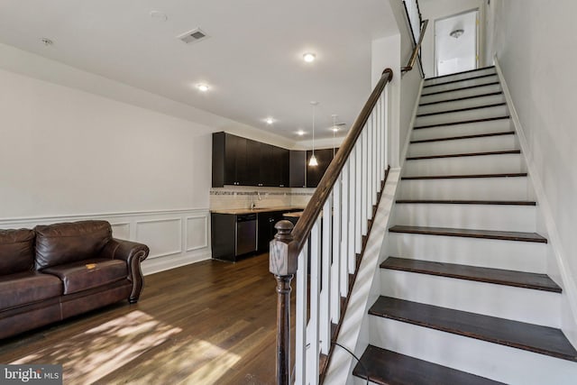 605 N 12th St Unit B, Philadelphia, PA 19123 - stairway with wood finished floors, a wainscoted wall, and recessed lighting
