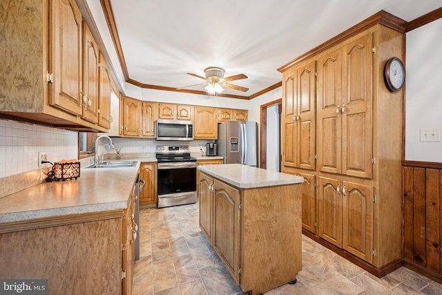 112 Tennessee Trl, Browns Mills, NJ 08015 - kitchen with stainless steel appliances, a center island, backsplash, light countertops, and crown molding