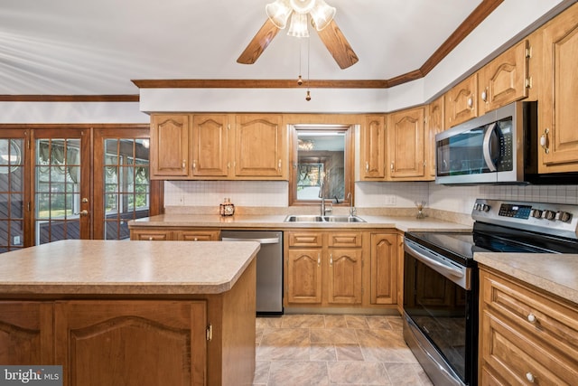 112 Tennessee Trl, Browns Mills, NJ 08015 - kitchen featuring appliances with stainless steel finishes, healthy amount of natural light, backsplash, ceiling fan, and crown molding
