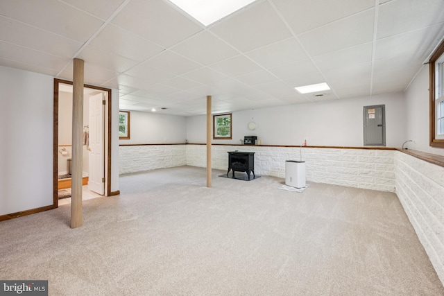 112 Tennessee Trl, Browns Mills, NJ 08015 - basement with carpet floors, a paneled ceiling, and a wainscoted wall