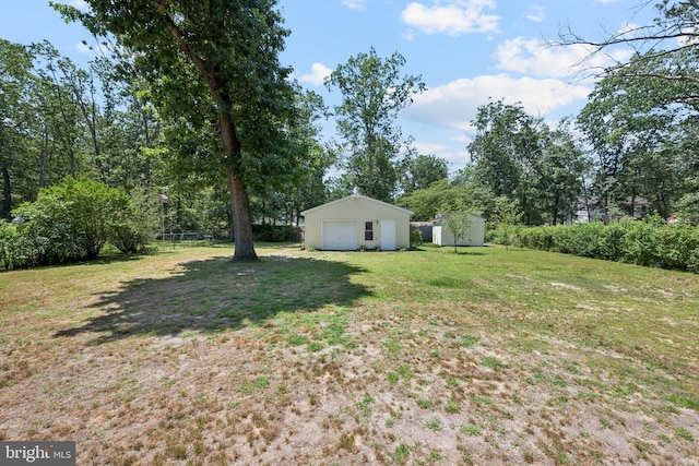 112 Tennessee Trl, Browns Mills, NJ 08015 - view of yard featuring an outbuilding and a garage