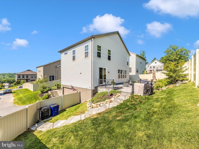 9929 Arapahoe Rd, New Market, MD 21774 - rear view of property with a fenced backyard, a residential view, and a patio area