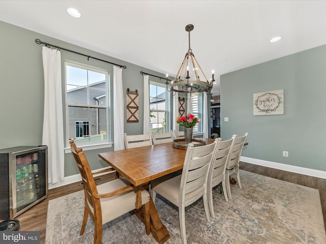 9929 Arapahoe Rd, New Market, MD 21774 - dining area with a chandelier, wood finished floors, recessed lighting, and beverage cooler