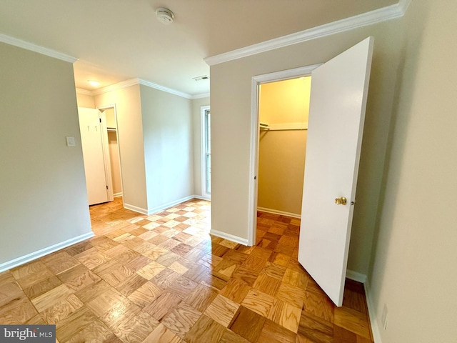 868 Quince Orchard Blvd Unit 202, Gaithersburg, MD 20878 - unfurnished bedroom featuring a spacious closet, a closet, and ornamental molding