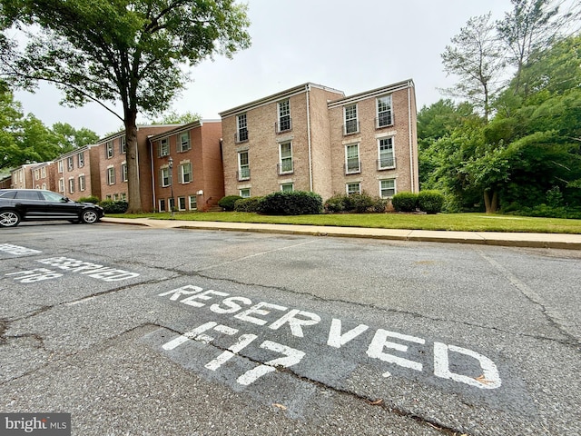 868 Quince Orchard Blvd Unit 202, Gaithersburg, MD 20878 - view of property featuring uncovered parking