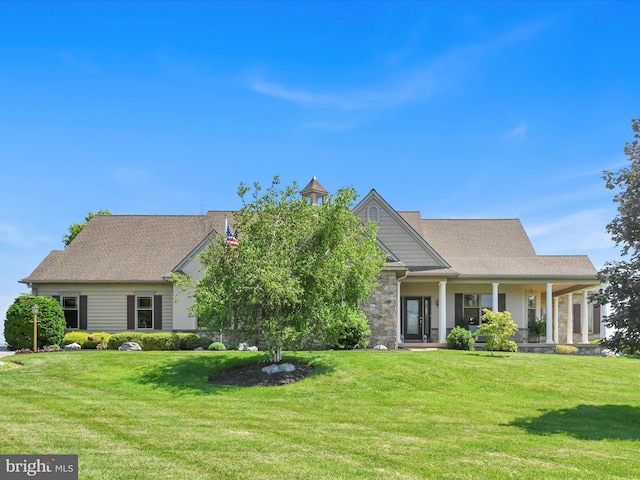 2768 Zink Rd, Manheim, PA 17545 - view of front of home featuring a front lawn, covered porch, and stone siding