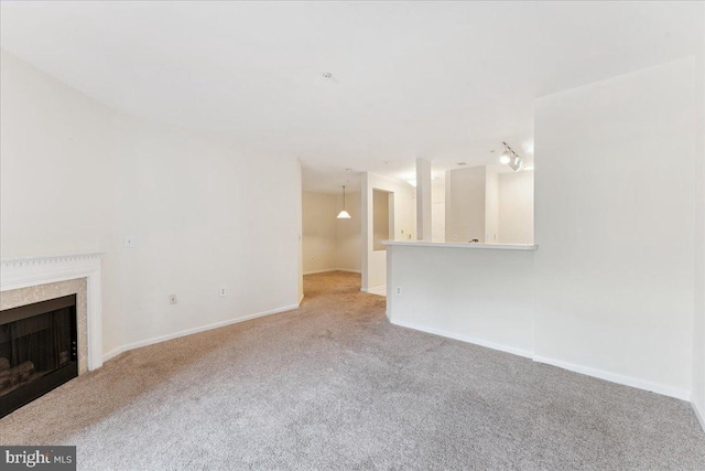 12919 Alton Sq Unit 116, Herndon, VA 20170 - unfurnished living room featuring carpet floors and a premium fireplace