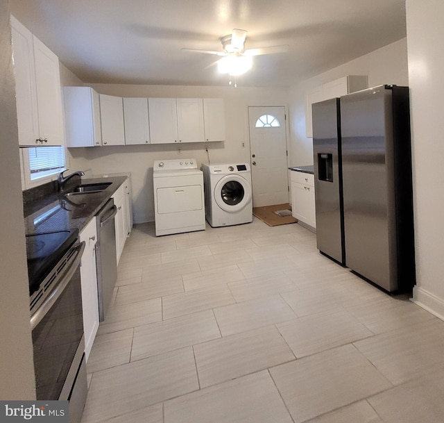 244 6th St, Colonial Beach, VA 22443 - laundry area with washer and dryer, ceiling fan, and plenty of natural light