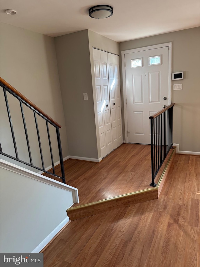 11450 Fruitwood Way Unit 92, Germantown, MD 20876 - foyer with light wood finished floors and stairs
