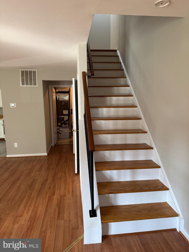 11450 Fruitwood Way Unit 92, Germantown, MD 20876 - staircase featuring wood finished floors