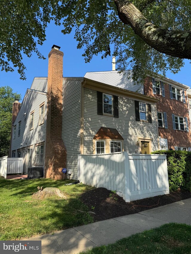 11450 Fruitwood Way Unit 92, Germantown, MD 20876 - view of front of home featuring a chimney