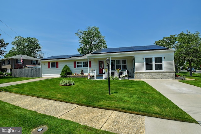 24 Haddon Rd, Somers Point, NJ 08244 - ranch-style home with a porch, solar panels, and stone siding