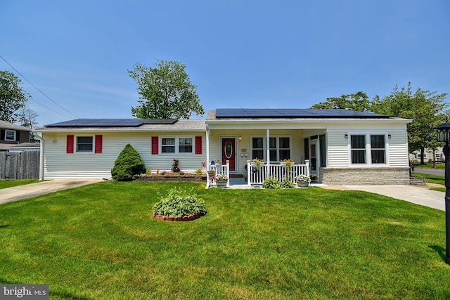 24 Haddon Rd, Somers Point, NJ 08244 - single story home with covered porch, solar panels, and stone siding