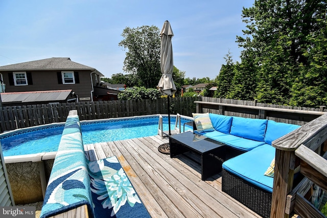 24 Haddon Rd, Somers Point, NJ 08244 - view of swimming pool featuring a fenced backyard and a wooden deck