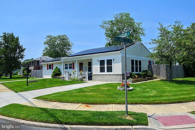 24 Haddon Rd, Somers Point, NJ 08244 - ranch-style home with covered porch, solar panels, and stone siding