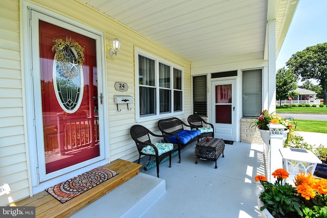 24 Haddon Rd, Somers Point, NJ 08244 - view of exterior entry featuring a porch