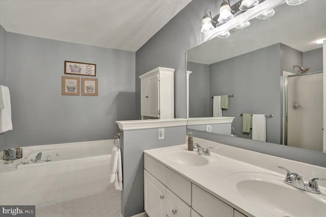 14 Wyomissing Ct, Wyomissing, PA 19610 - full bath featuring double vanity, a garden tub, a shower stall, and tile patterned flooring