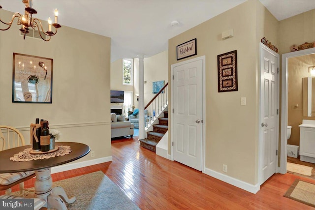 14 Wyomissing Ct, Wyomissing, PA 19610 - entrance foyer featuring wood finished floors, a chandelier, and stairs