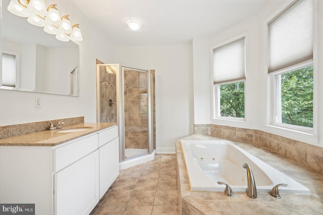 3612 Fait Ave, Baltimore, MD 21224 - full bath with vanity, a stall shower, a whirlpool tub, and tile patterned flooring
