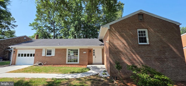 3478 Pence Ct, Annandale, VA 22003 - view of front of property featuring an attached garage, brick siding, a front yard, and concrete driveway