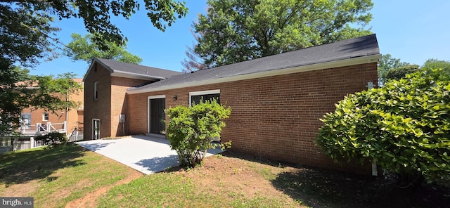 3478 Pence Ct, Annandale, VA 22003 - view of front of house featuring a patio, brick siding, and a front lawn