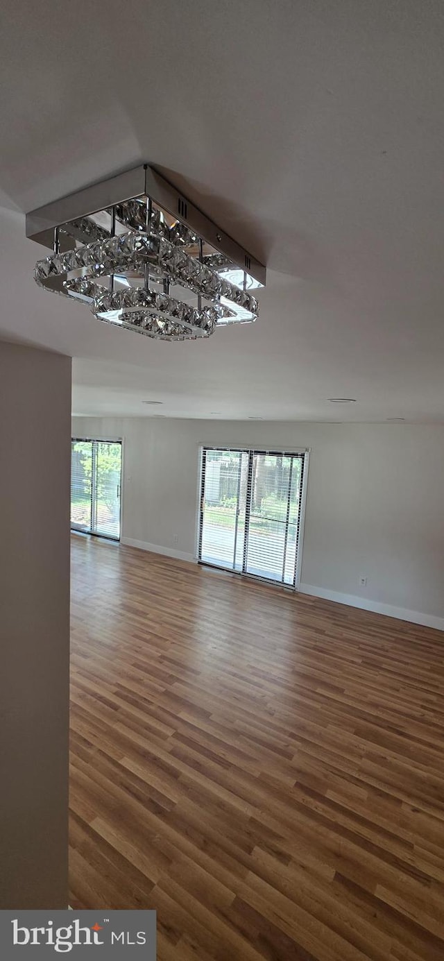 3478 Pence Ct, Annandale, VA 22003 - spare room with wood finished floors and plenty of natural light