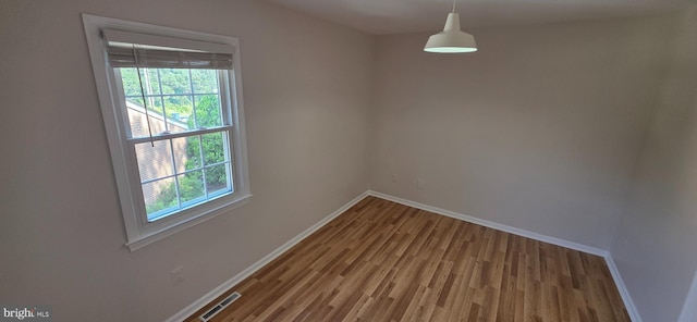 3478 Pence Ct, Annandale, VA 22003 - spare room featuring healthy amount of natural light and wood finished floors